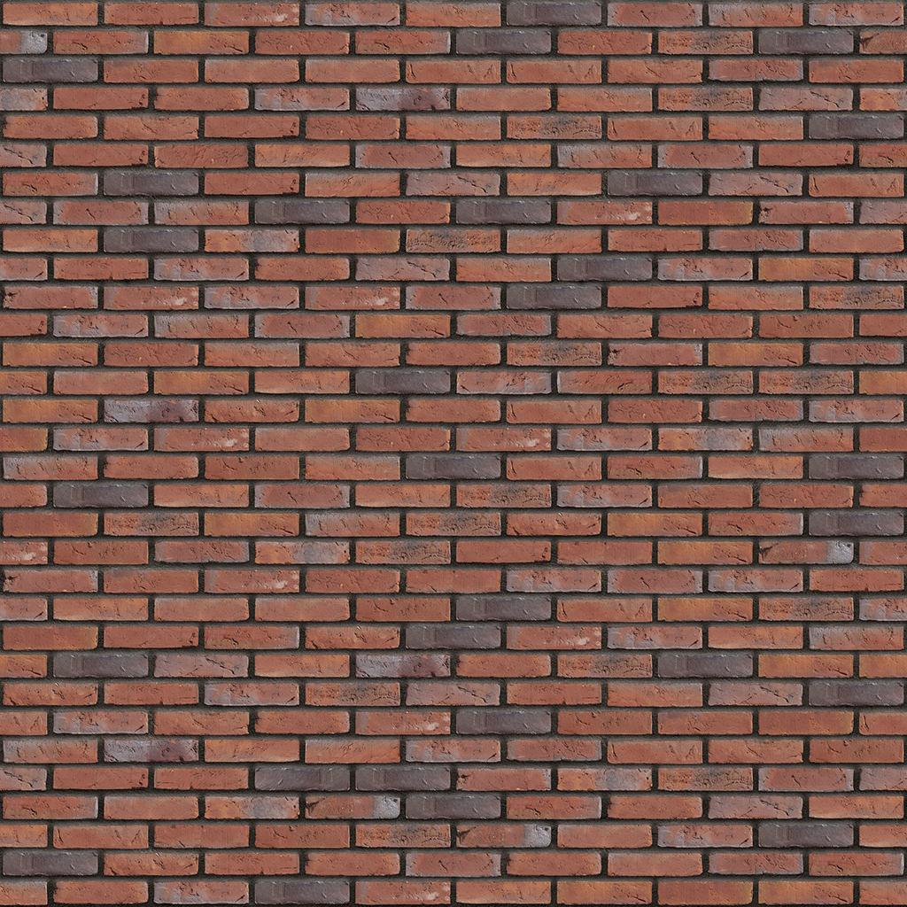 Rote Backsteinmauer mit dunkleren Fugen, gleichmaessiges Muster